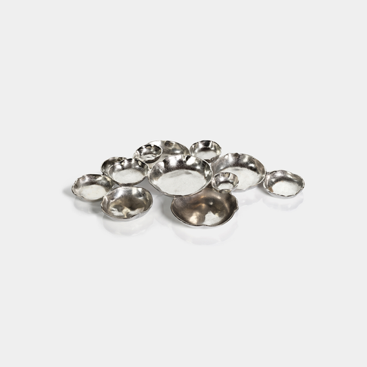 Cluster of Twelve Round Silver Serving Bowls