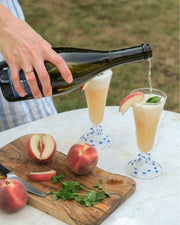 Blue Pom Champagne Flute by Issy Granger