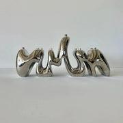 Chrome Menorah Sculpture