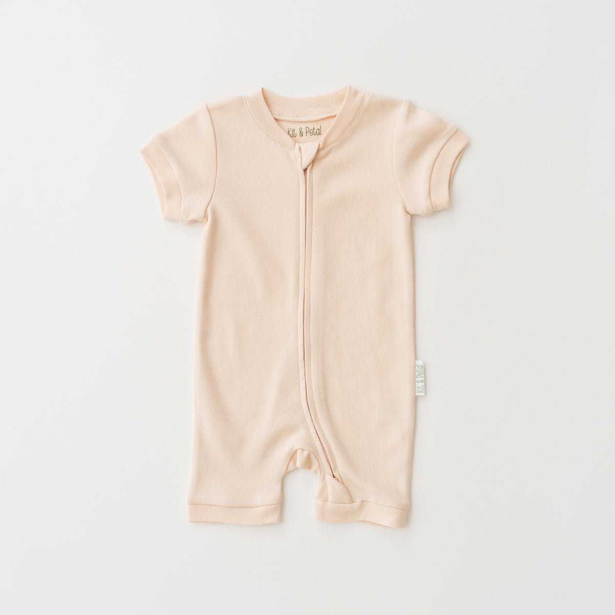 Short Sleeve Romper in Rosy Peach