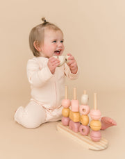 Long Sleeve Romper in Rosy Peach
