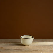 Cream Hand-Blown Glass Spout Bowl with Brown Rim