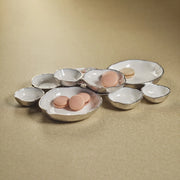 Cluster of Nine Round Serving Bowls in Nickel and White