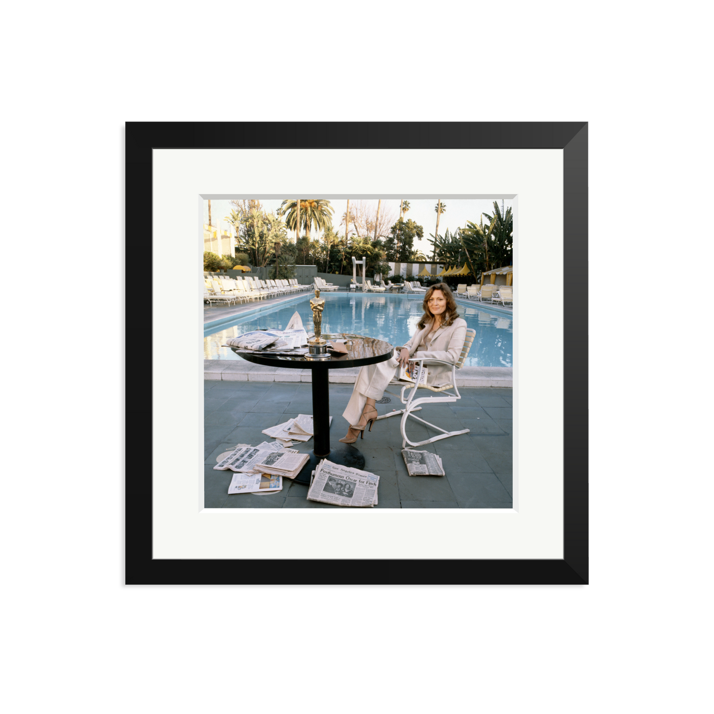Faye Dunaway Sits by the Pool